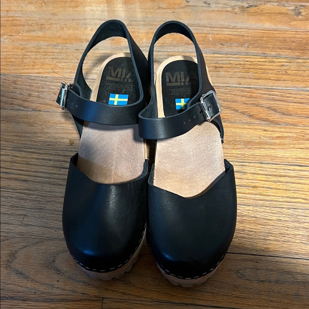 MIA Black Leather Slingback Clogs